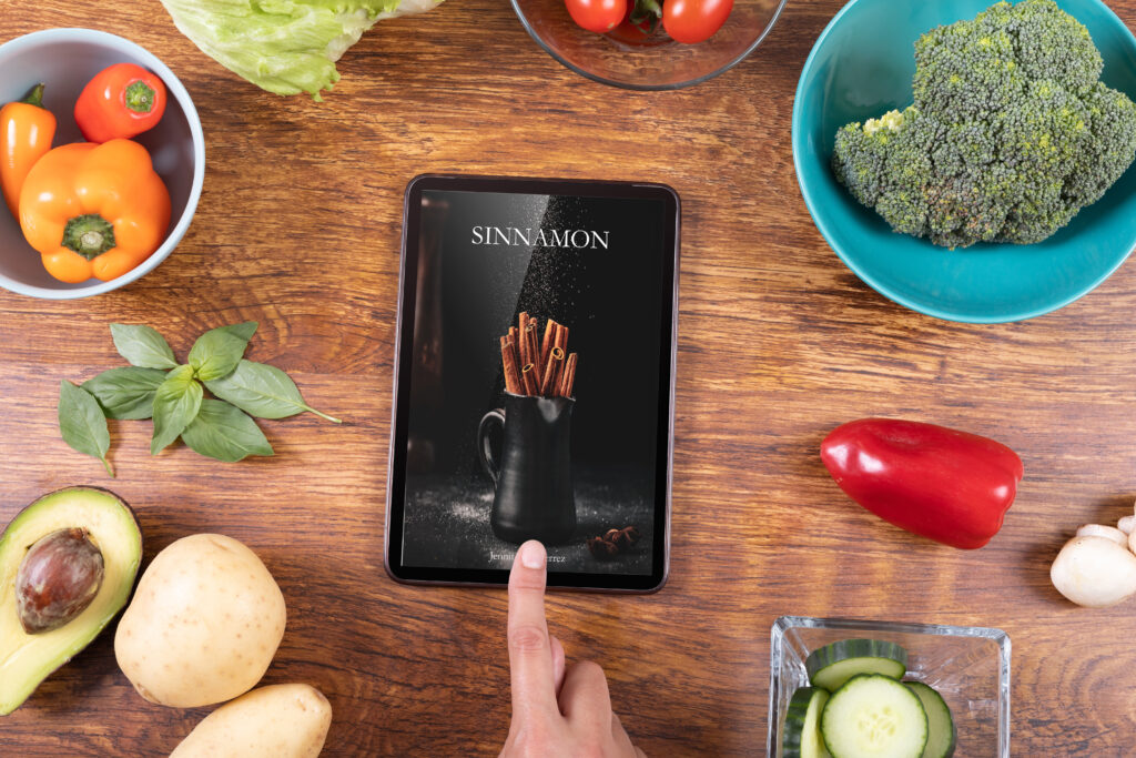 SINNAMON book cover on a tablet